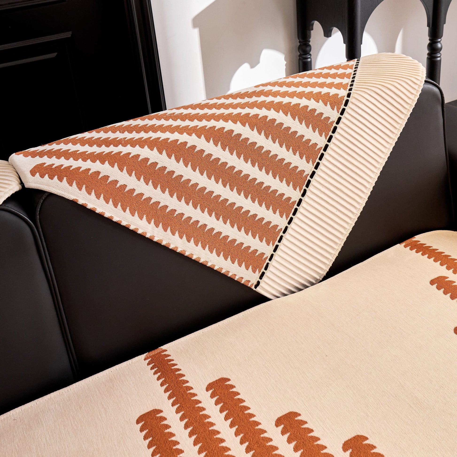 Vertical Stripes Sectional Sofa Cover Slipcover - Non-Slip, Fits L-Shape Couches in geometric pattern on black couch