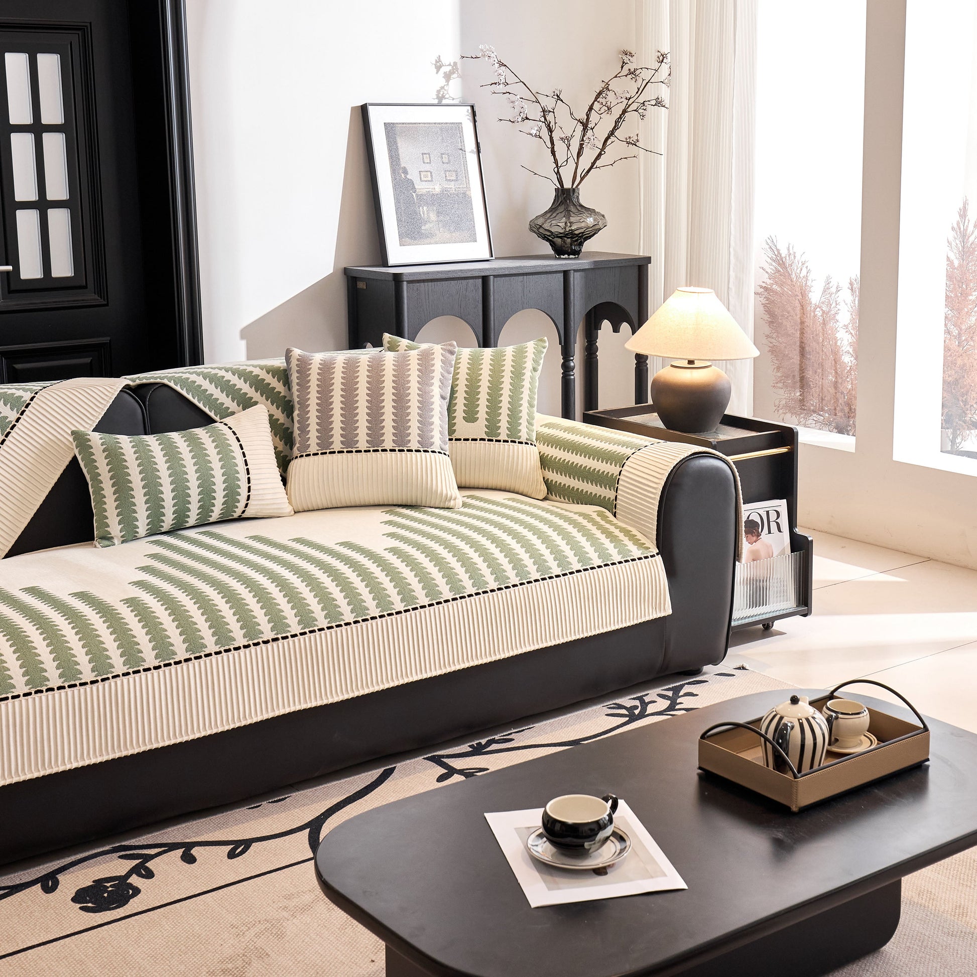 Vertical Stripes Sectional Sofa Cover Slipcover - Non-Slip, Fits L-Shape Couches on modern black sofa in elegant living room.