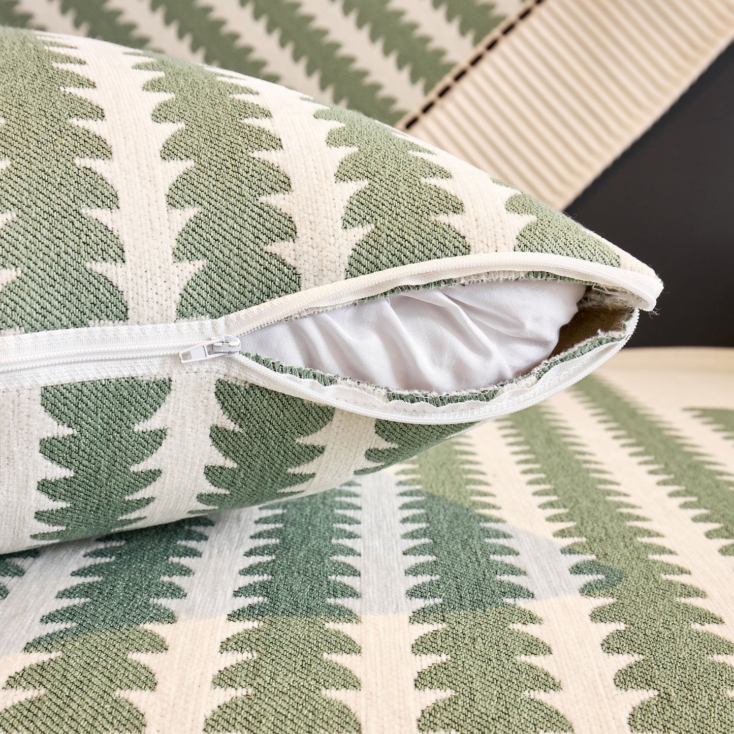 Close-up of Vertical Stripes Sectional Sofa Cover Slipcover showcasing zipper detail and textured chenille fabric with non-slip backing.