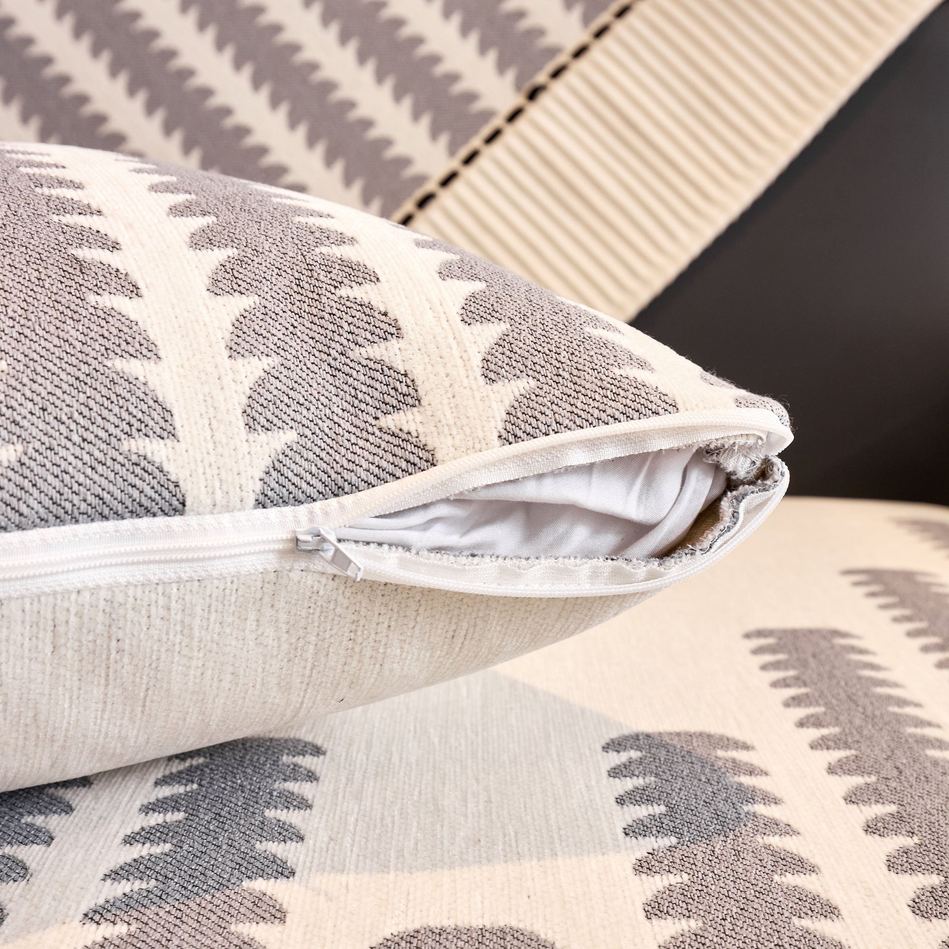 Close-up of Vertical Stripes Sectional Sofa Cover Slipcover - Non-Slip, Fits L-Shape Couches with geometric pattern.