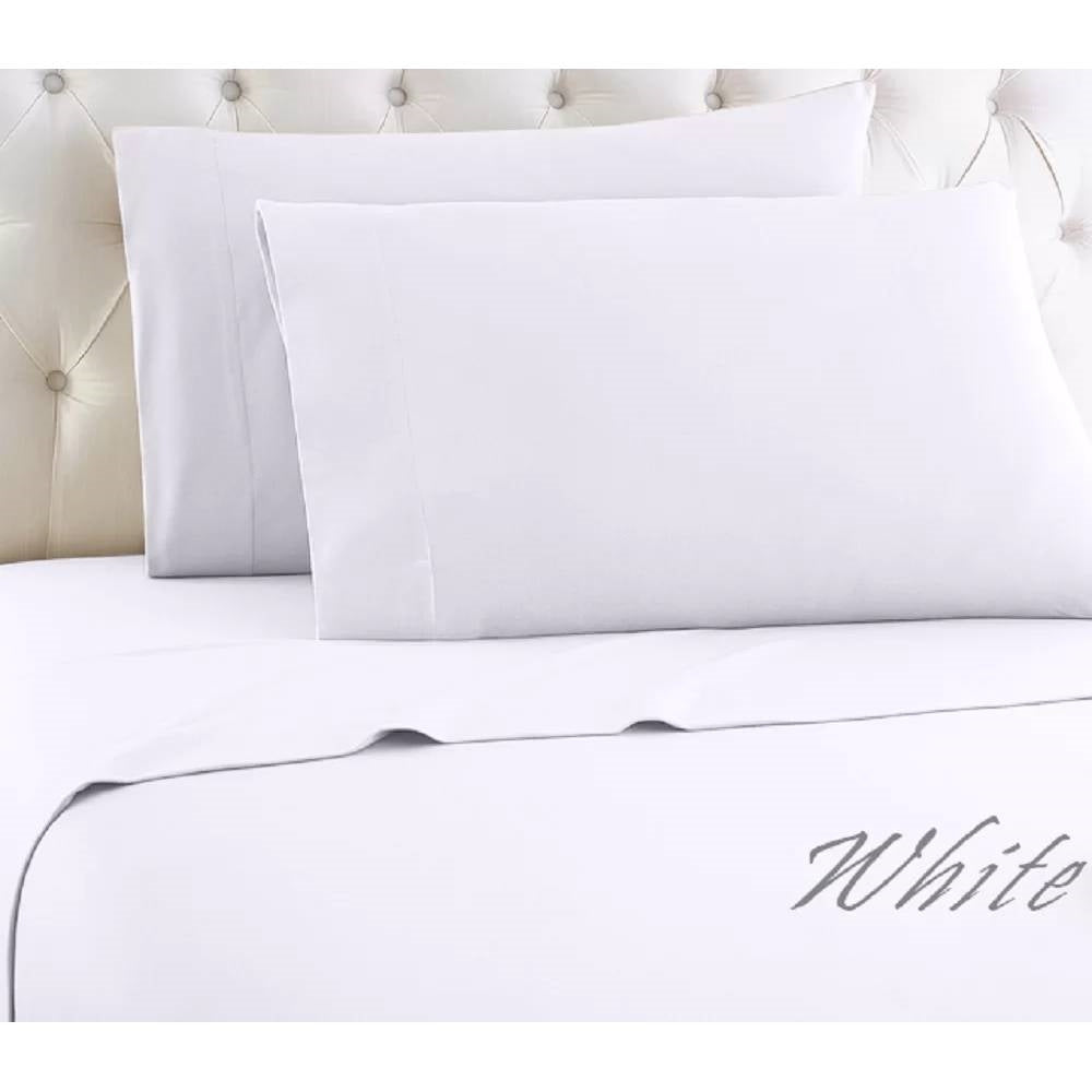 Full 4-Piece Egyptian 100-Percent Cotton 1000 Thread Count Sheet Set - White on bed with pillows.