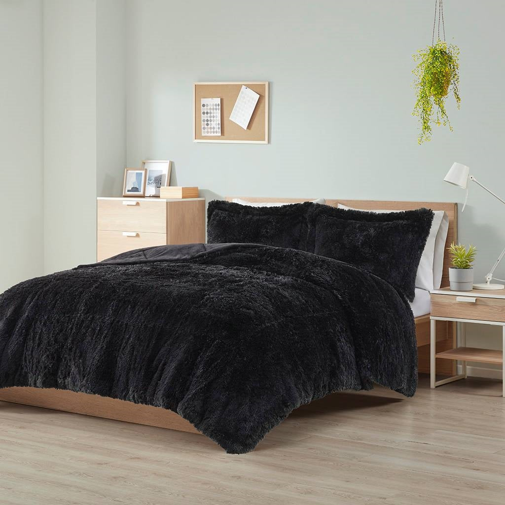 Full/Queen Black Soft Sherpa Faux Fur 3-Piece Comforter Set with Pillow Shams on a modern bedroom bed