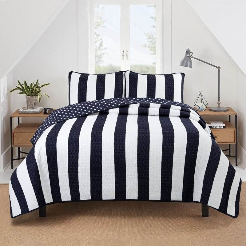 Full/Queen 3 Piece Navy Blue White Stars Stripes 100-Percent Cotton Quilt Set on bed in bright room