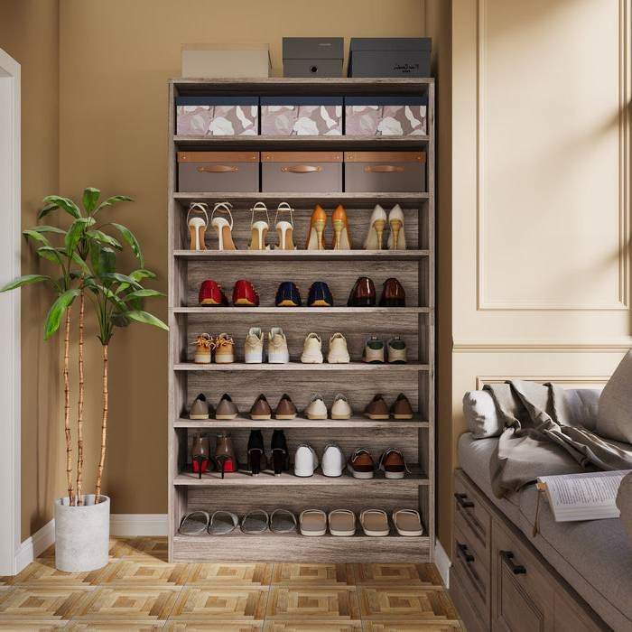 8-Shelf Shoe Rack Storage Cabinet in Grey Wood Finish - Holds Up To 45 Pairs with multiple shoes displayed in a room setting.