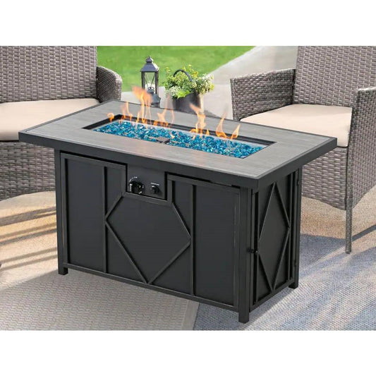 42-inch Outdoor Propane Gas Fire Pit Patio Table with Blue Fire Glass providing warmth on a patio.