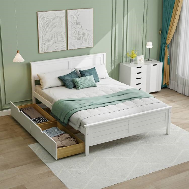Full Size White Platform Bed Frame with 2 Storage Drawers in a modern bedroom setting with decorative items and natural lighting.