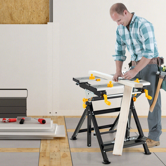 Man using Folding Work Table with Tiltable Platform and 7-level Adjustable Height-Black in a workshop setting.