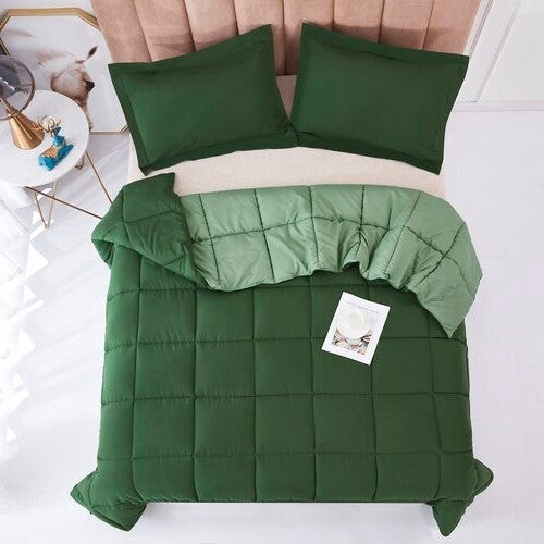 Full/Queen Traditional Microfiber Reversible 3 Piece Comforter Set in Green on bed.
