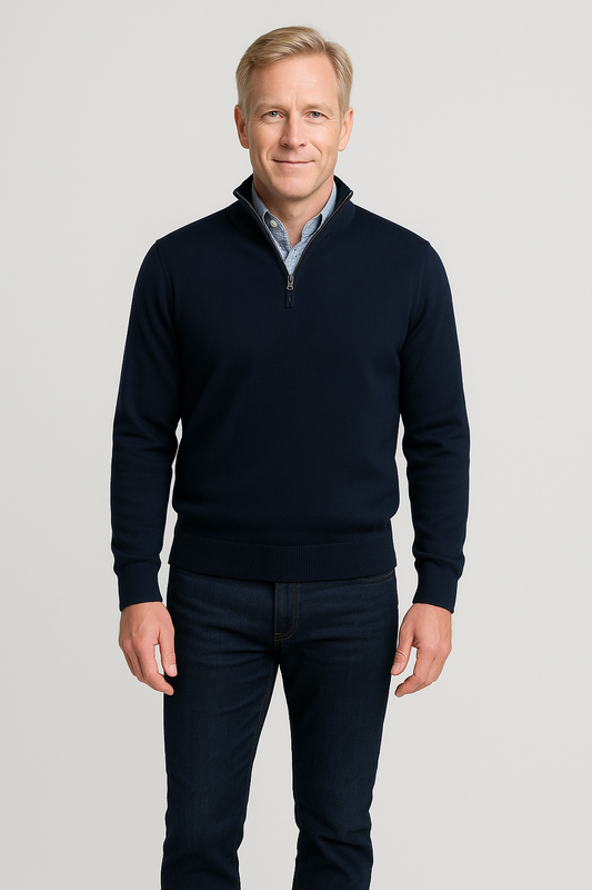 Man wearing a Merino Wool Quarter-Zip Sweater in Navy with ribbed cuffs and hem, perfect for layering, made in Italy.