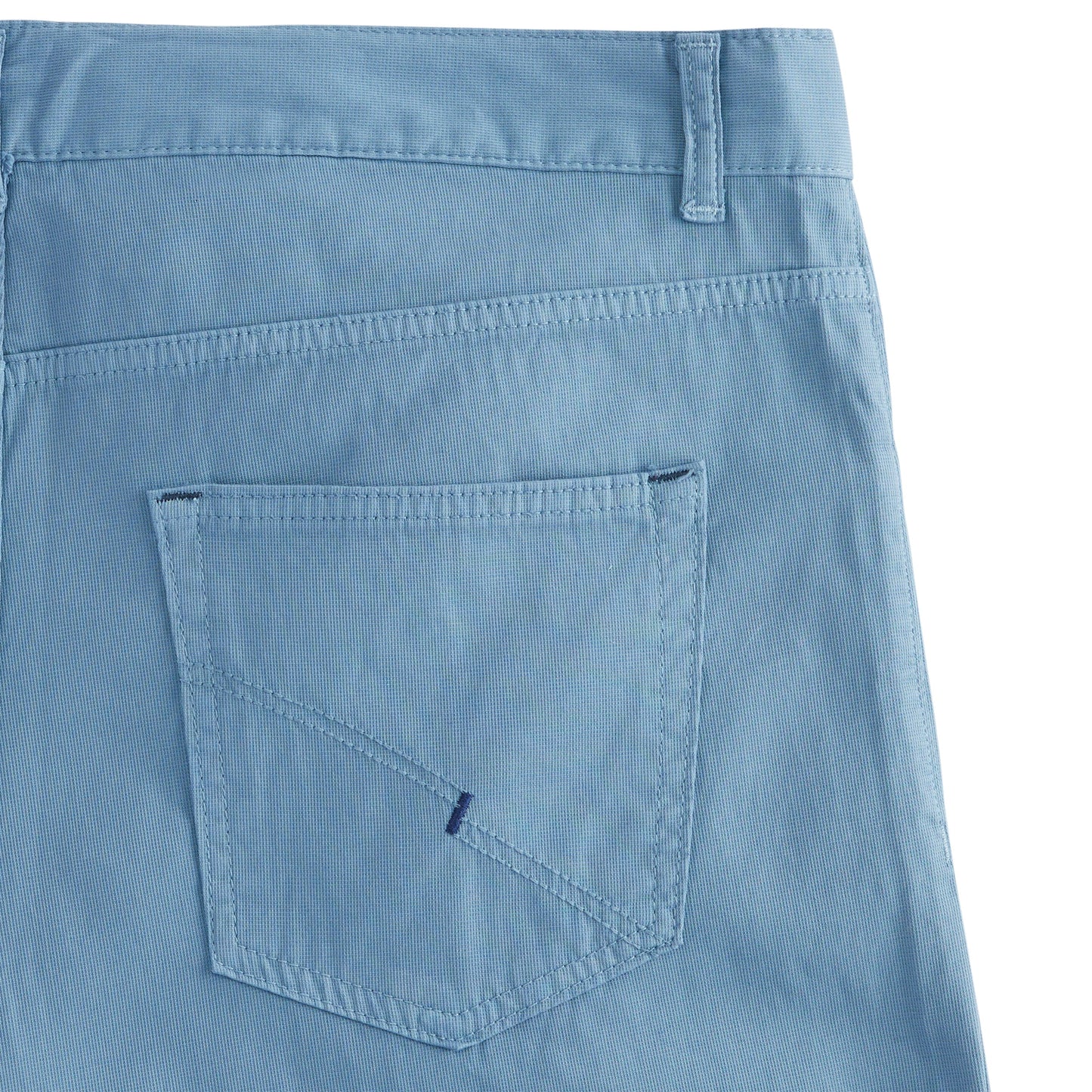 Back view of the 5 Pocket Jean Model in light blue, featuring cleanly-stitched finish and tailored straight leg design.