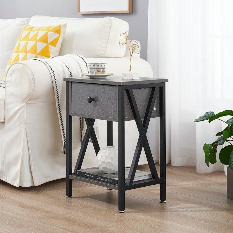 Set of 2 - 1 Drawer Nightstand in Grey and Black Wood Finish with X-shaped accents and open shelf, next to a white sofa.