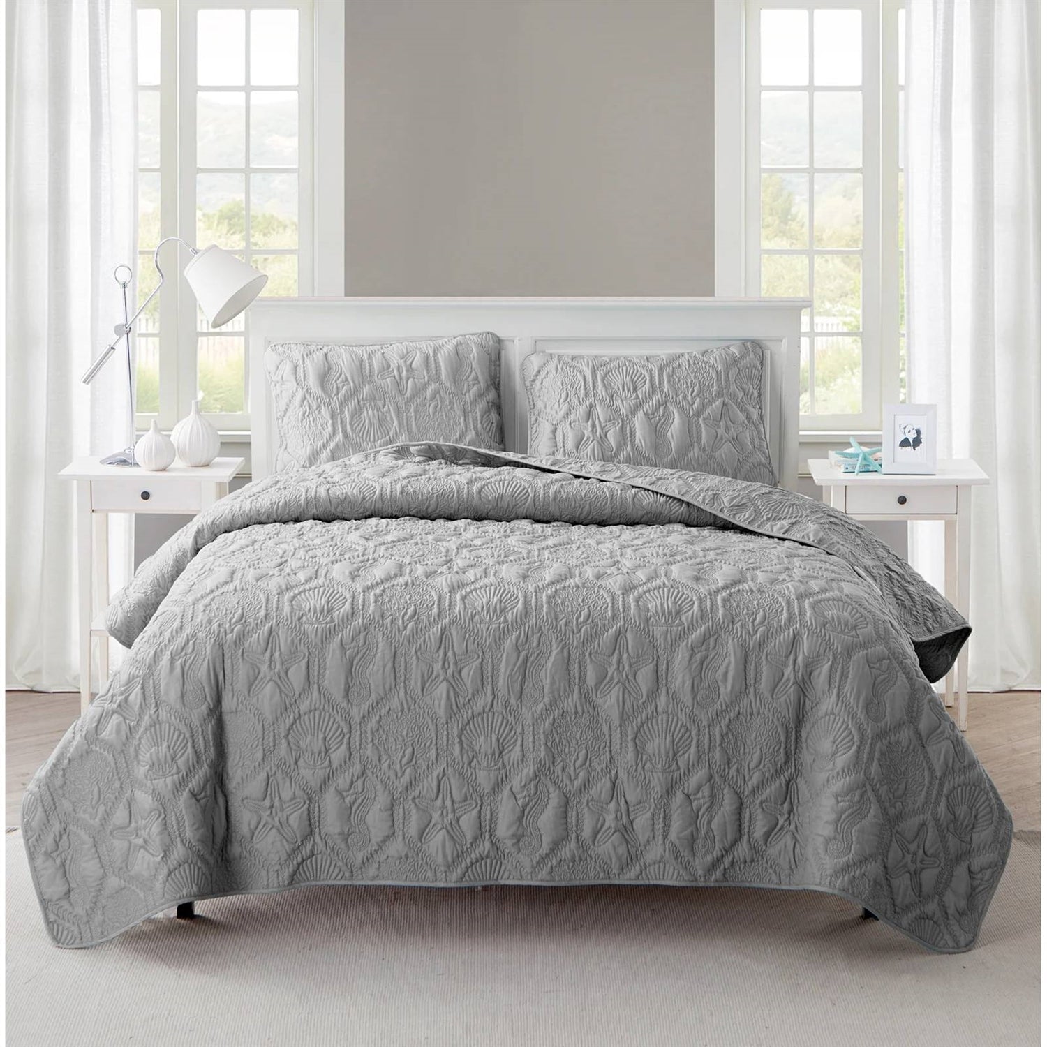 King Coastal Beach Embossed Starfish Seashell Seahorse Grey 3-Piece Quilt Set on bed with white nightstands