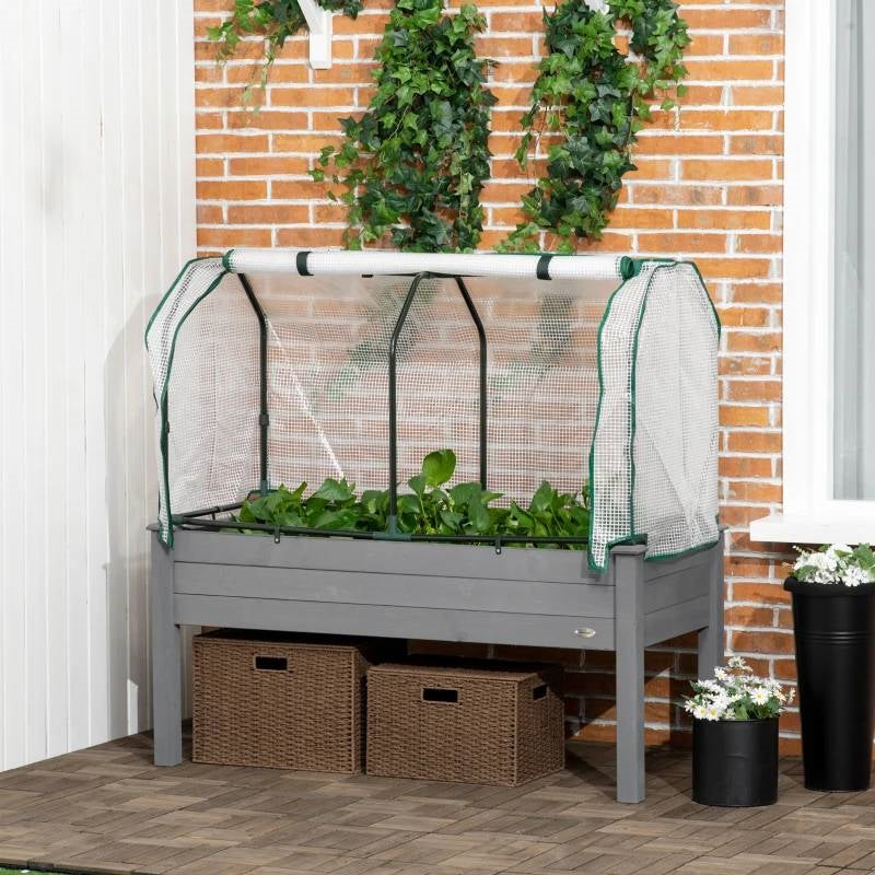 Grey Wood Elevated Raised Garden Bed Planter with Greenhouse Cover for optimal plant growth and protection on patio