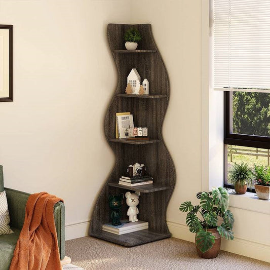 Modern 5 Shelf Corner Bookcase in Grey Wood Finish with decorative items in a cozy living room corner.