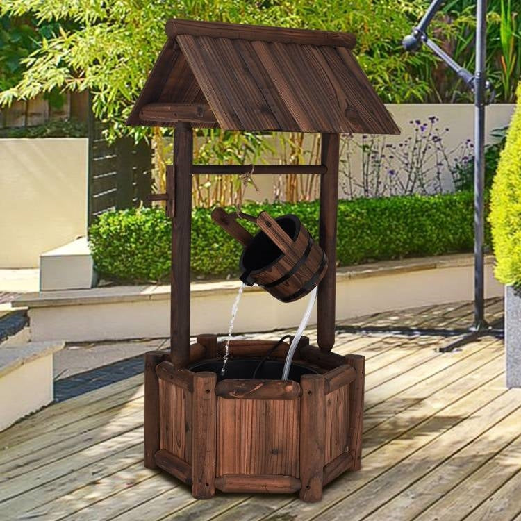 Outdoor Patio Garden Solid Wood Wishing Well Water Fountain with Pump in a garden setting, enhancing backyard ambiance.