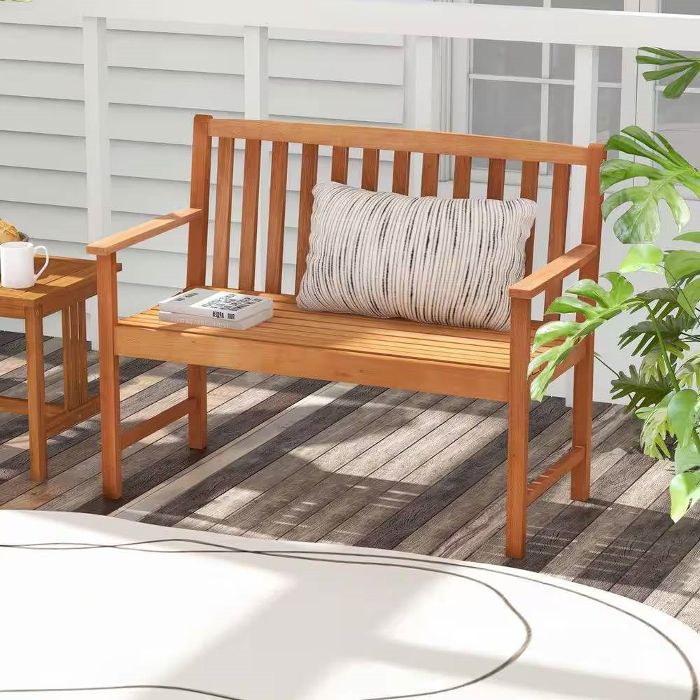 Solid Wood 4-Ft. Outdoor Patio Garden Bench - 800 lbs. Weight Capacity with cushion and coffee table on deck