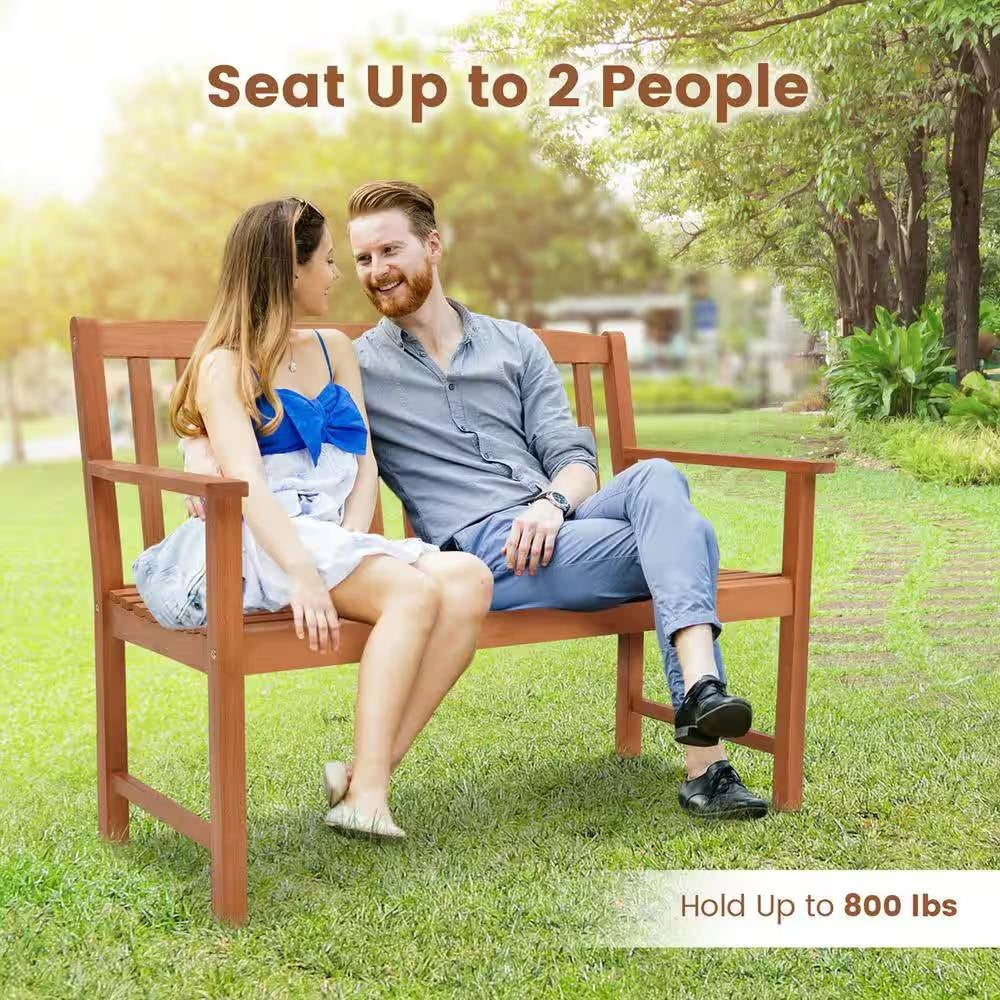 Solid Wood 4-Ft. Outdoor Patio Garden Bench - 800 lbs. Weight Capacity seating two people on grass