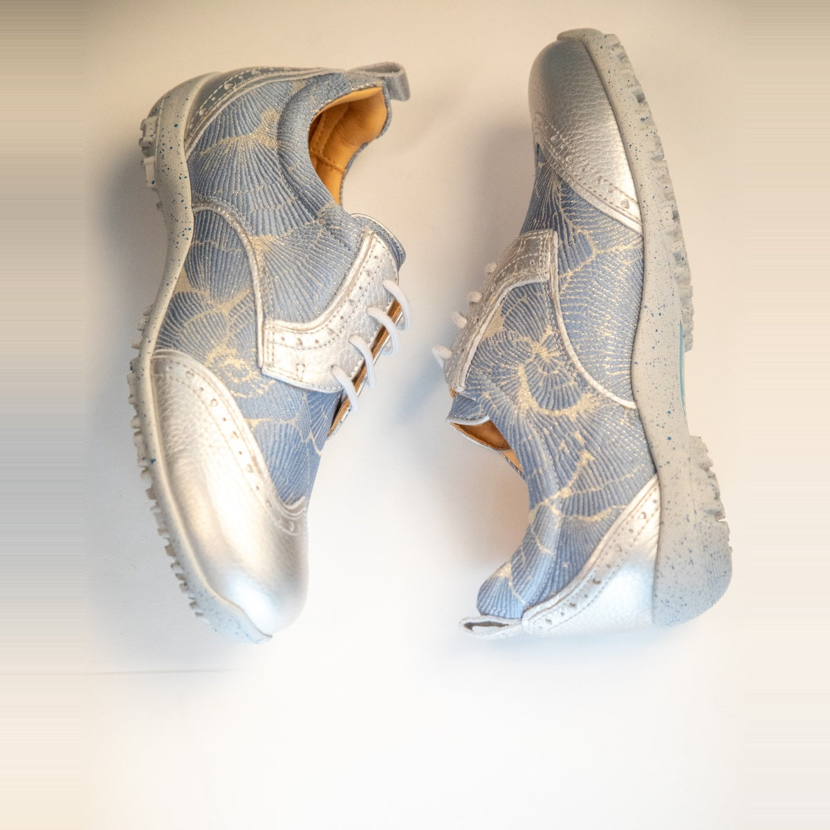 WesTees Grace shoes with abstract blue and silver print, breathable cork insole and water-resistant material for golf elegance.