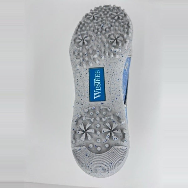 WesTees Grace shoe sole with unique grip pattern for performance in golf, featuring blue branding and speckled design.