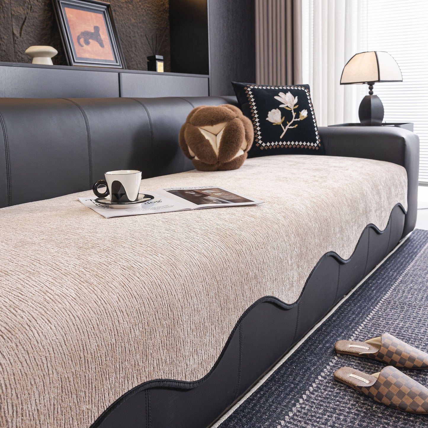 Chenille Couch Cover with Scalloped Edge on leather sofa, featuring non-slip modular slipcover design, elegant living room decor