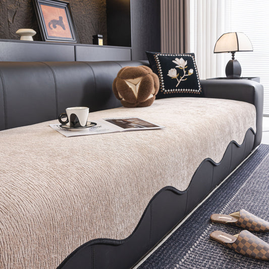 Chenille Couch Cover with Scalloped Edge on leather sofa, featuring non-slip modular slipcover design, elegant living room decor