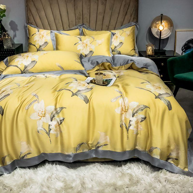 Orquidea Amarilla Duvet Cover Set (Egyptian Cotton) with elegant floral pattern on a stylish luxury bed setting.