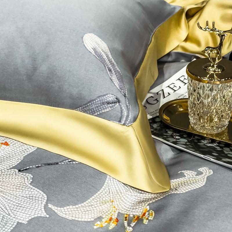 Orquidea Clara Duvet Cover Set (Eucalyptus Lyocell) in a luxurious bedroom setting with intricate royal pattern and elegant accents.