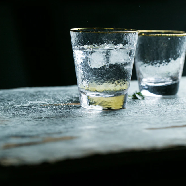 Golden Rim Clear Whiskey & Water Glass showcasing durable, eco-friendly design, perfect for everyday use with a touch of elegance.