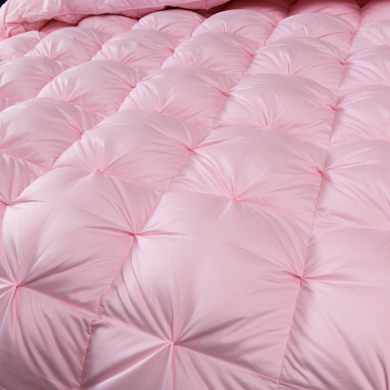 Giuseppina 1000 Thread Count Goose Down Comforter Duvet in blush pink on bed
