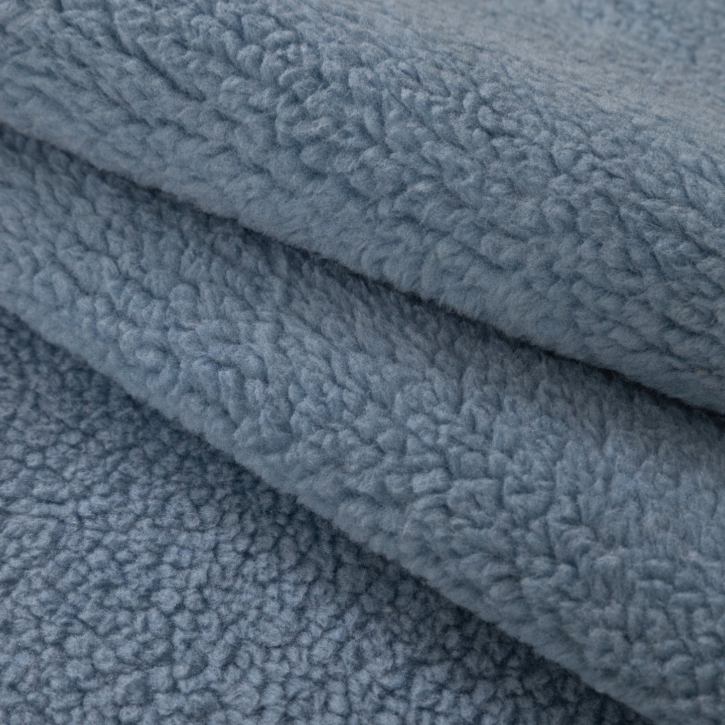 Luxury Sherpa Fleece Solid Sofa Towels Thickened Plush Non Slip Sofa Cushion Covers in blue sherpa fleece material close-up
