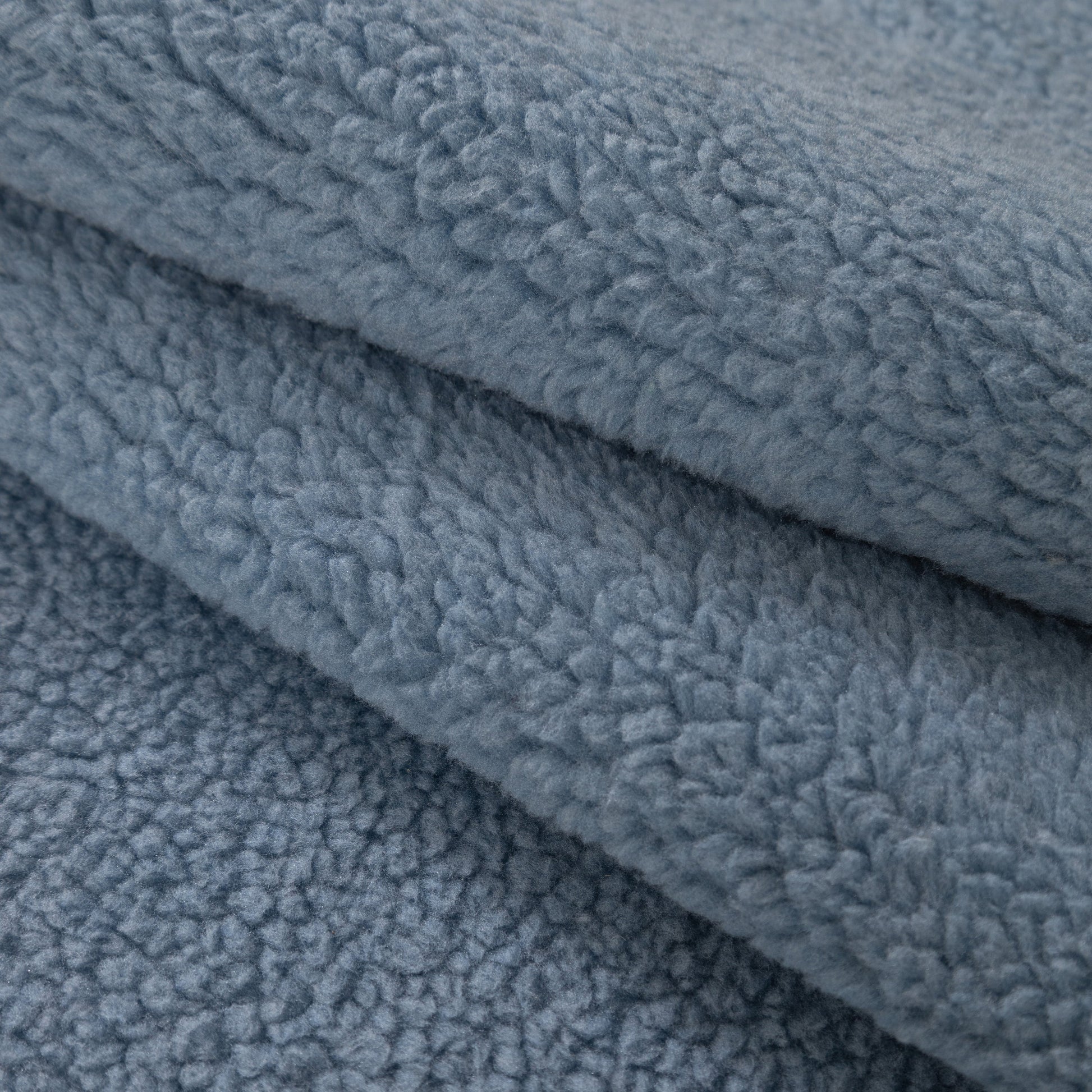 Luxury Sherpa Fleece Solid Sofa Towels Thickened Plush Non Slip Sofa Cushion Covers in blue sherpa fleece material close-up