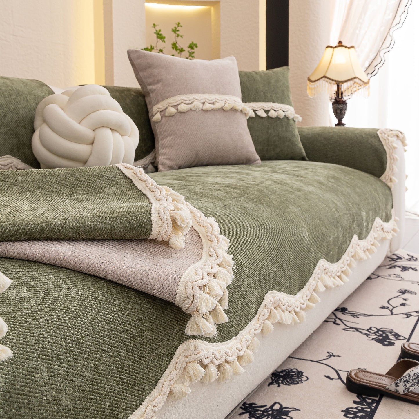 Chenille Sofa Cover Towel – Non-Slip, Washable Pets Couch Protector with Tassels on a cozy couch setting.