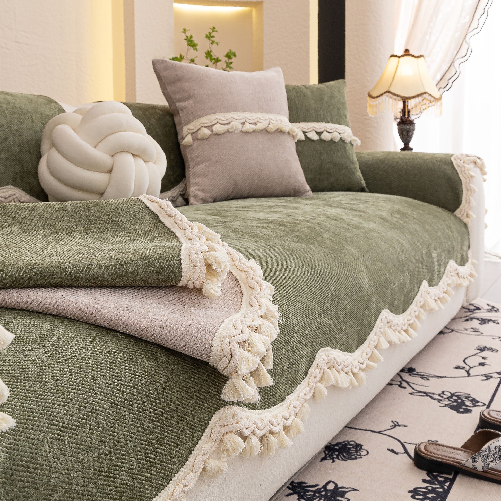 Chenille Sofa Cover Towel – Non-Slip, Washable Pets Couch Protector with Tassels on a cozy couch setting.