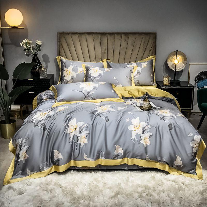 Orquidea Clara Duvet Cover Set (Eucalyptus Lyocell) displayed on a luxurious bed, featuring floral patterns and elegant design.