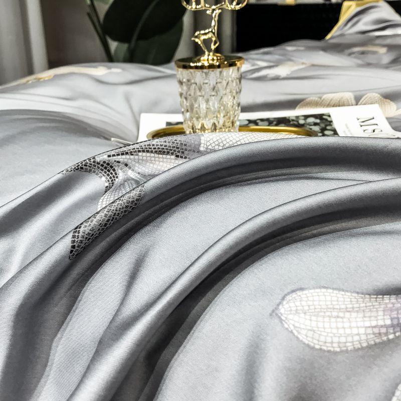 Orquidea Clara Duvet Cover Set (Eucalyptus Lyocell) with luxurious cotton-silk blend fabric and elegant design on a bed.