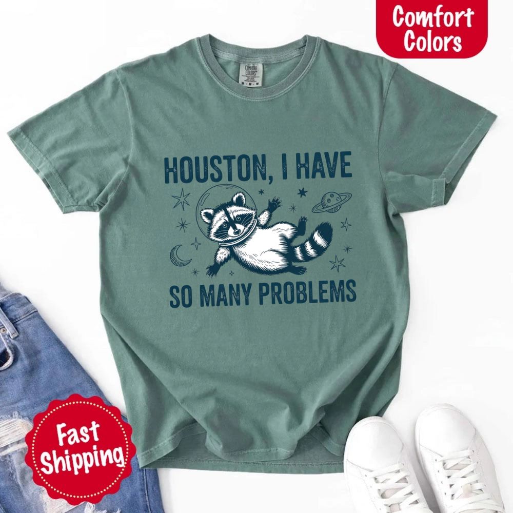 Houston I Have So Many Problems Raccoon Comfort Colors T-Shirts with space raccoon design, fast shipping, available now.