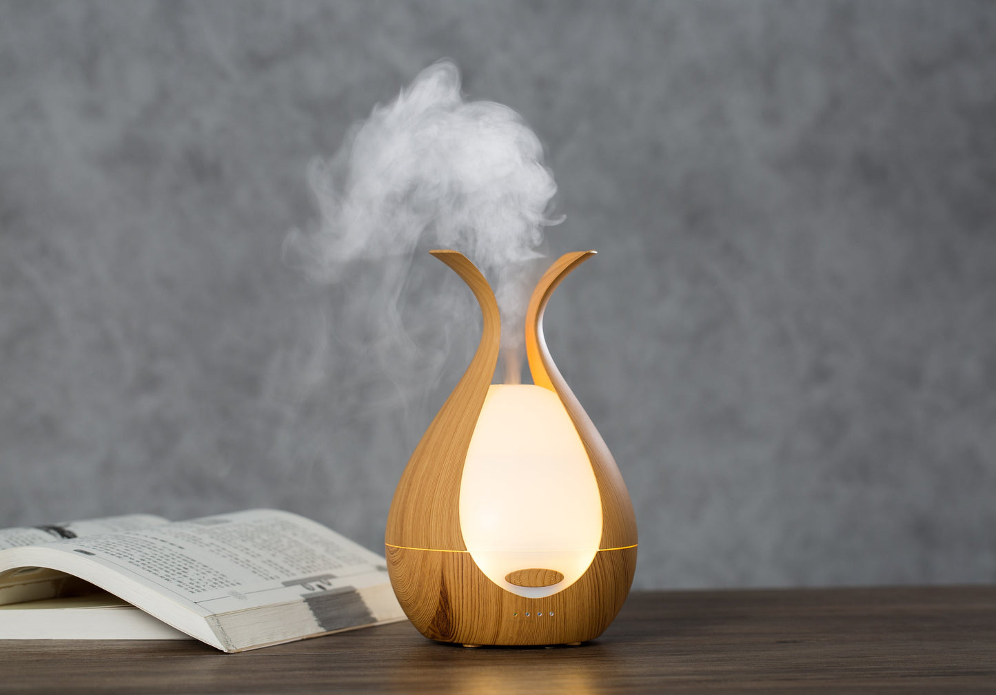 Timeless Diffuser emitting vapor with elegant wooden finish, ideal for aromatherapy with Timeless Essential Oils, featuring adjustable LED lights.