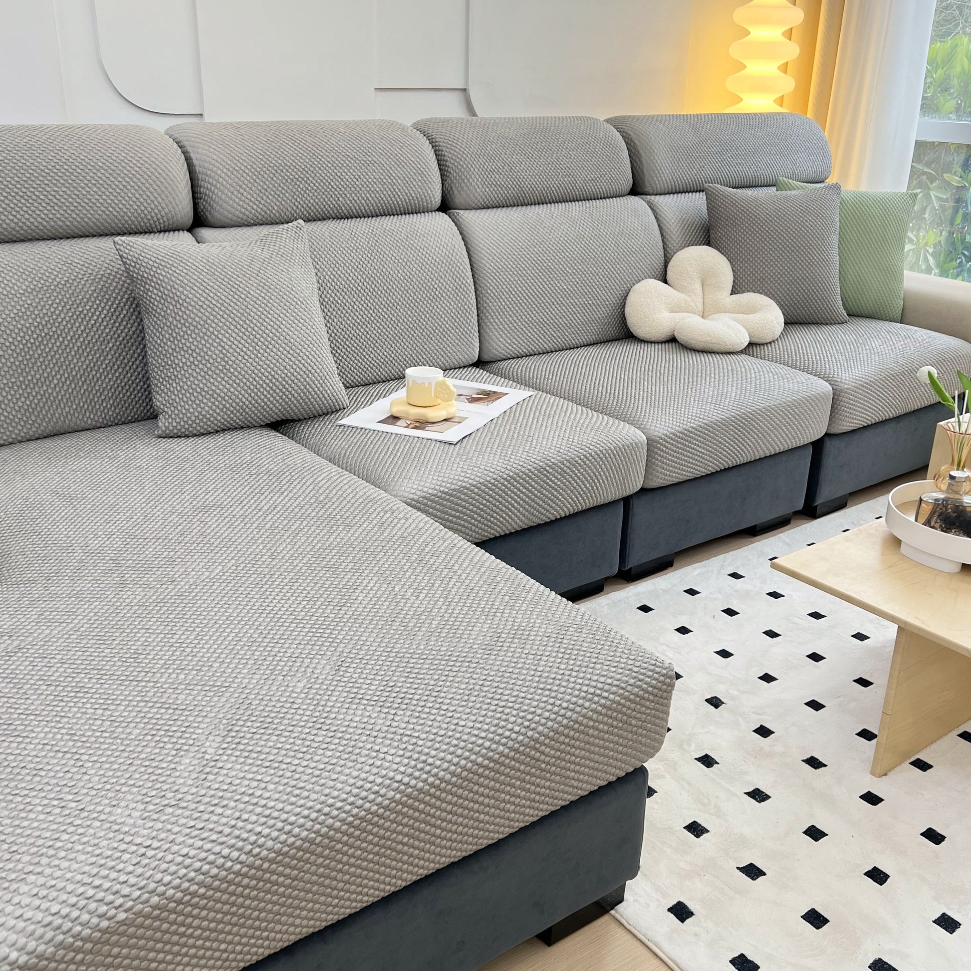 Cooling Stretch Sofa Seat Cushion Covers, Slip Covers for Cushions, Universal Couch Cushion Protector on a modern grey sofa.
