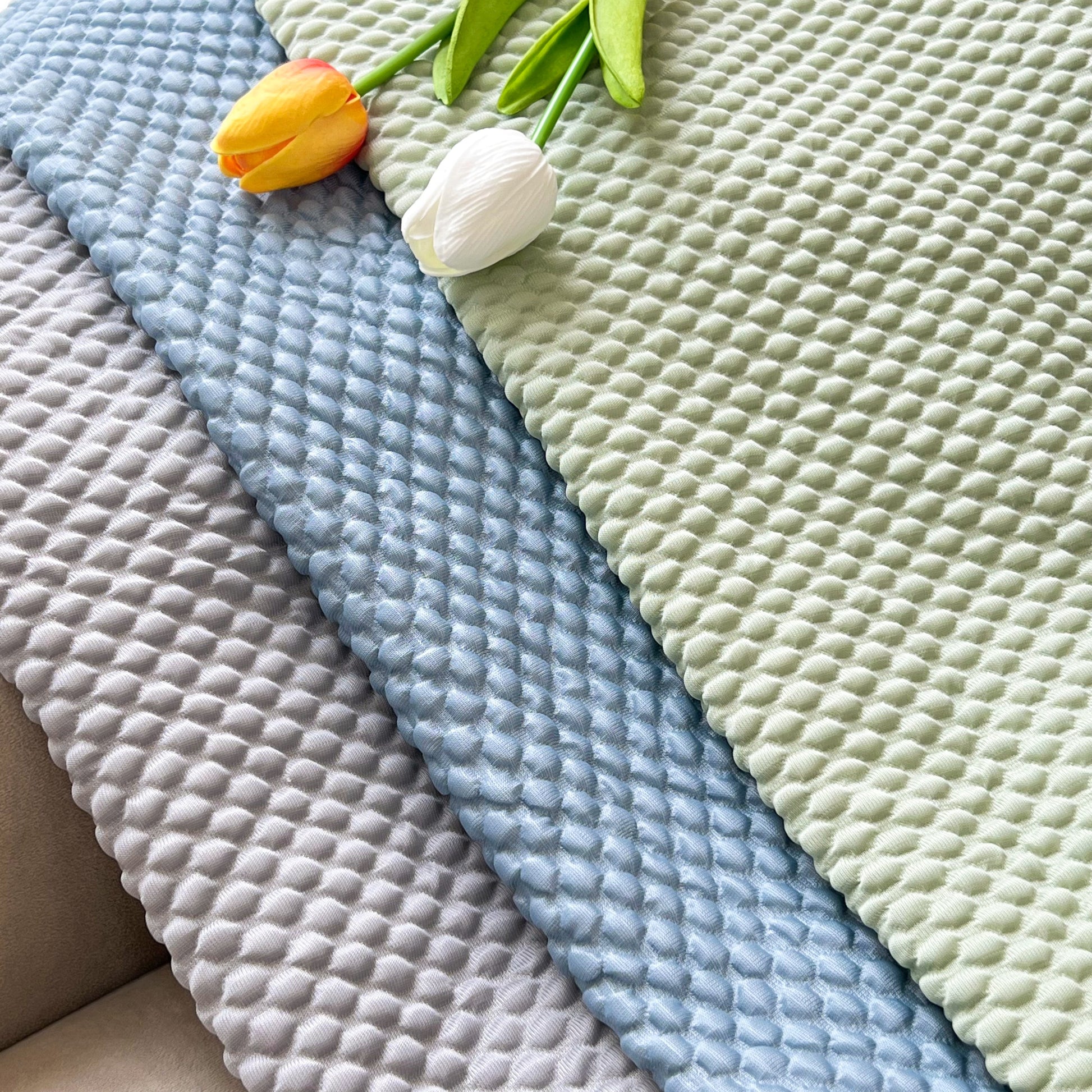 Cooling Stretch Sofa Seat Cushion Covers showcasing textured patterns with colorful tulip accents.