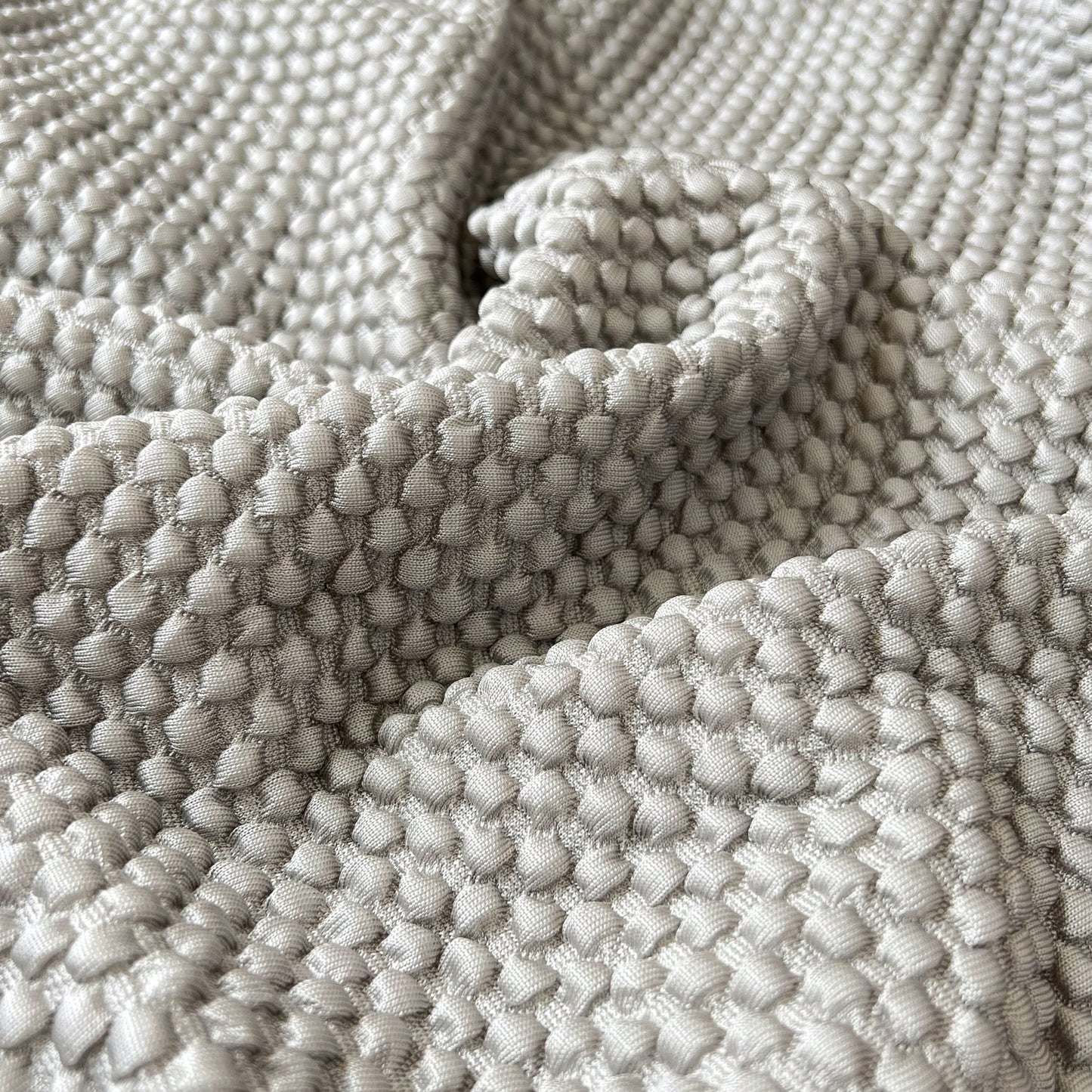 Close-up texture of Cooling Stretch Sofa Seat Cushion Covers showcasing the cooling fabric design.