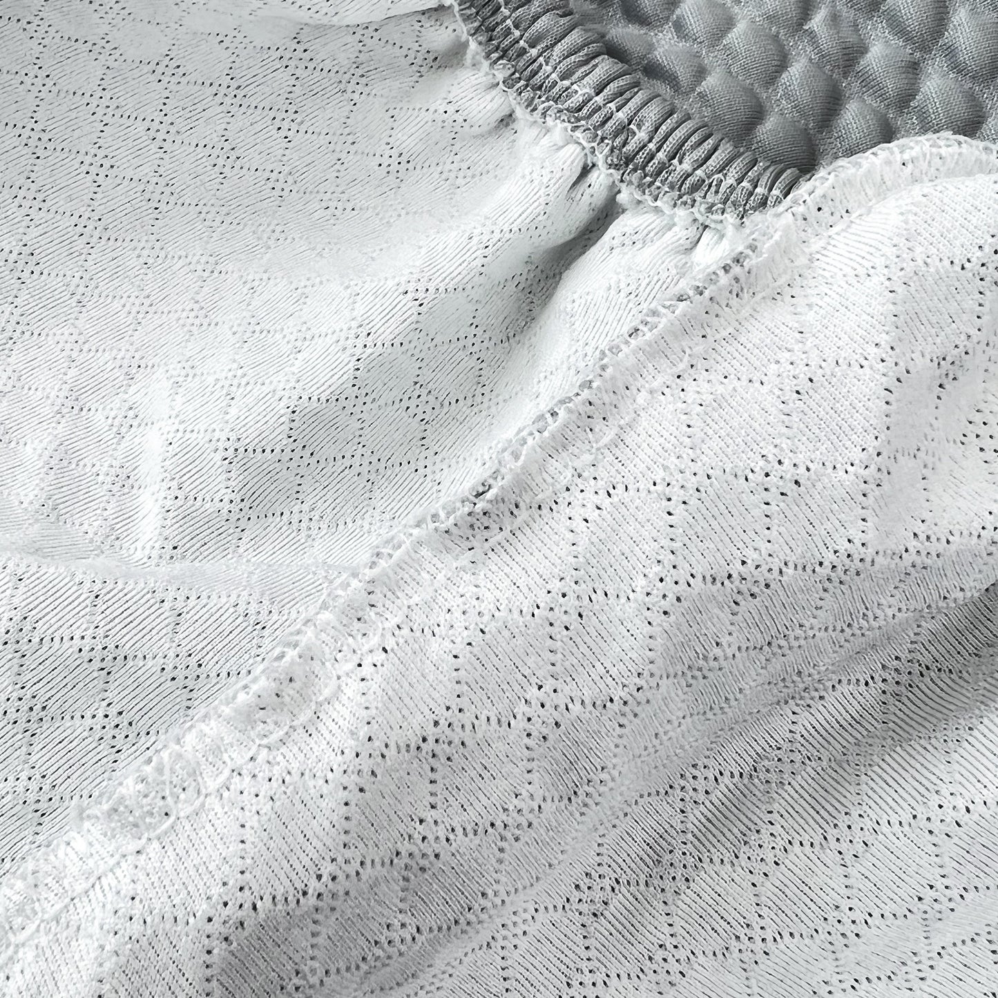 Close-up of Cooling Stretch Sofa Seat Cushion Covers showcasing stretch design and cooling fabric texture, ideal slip covers for cushions.