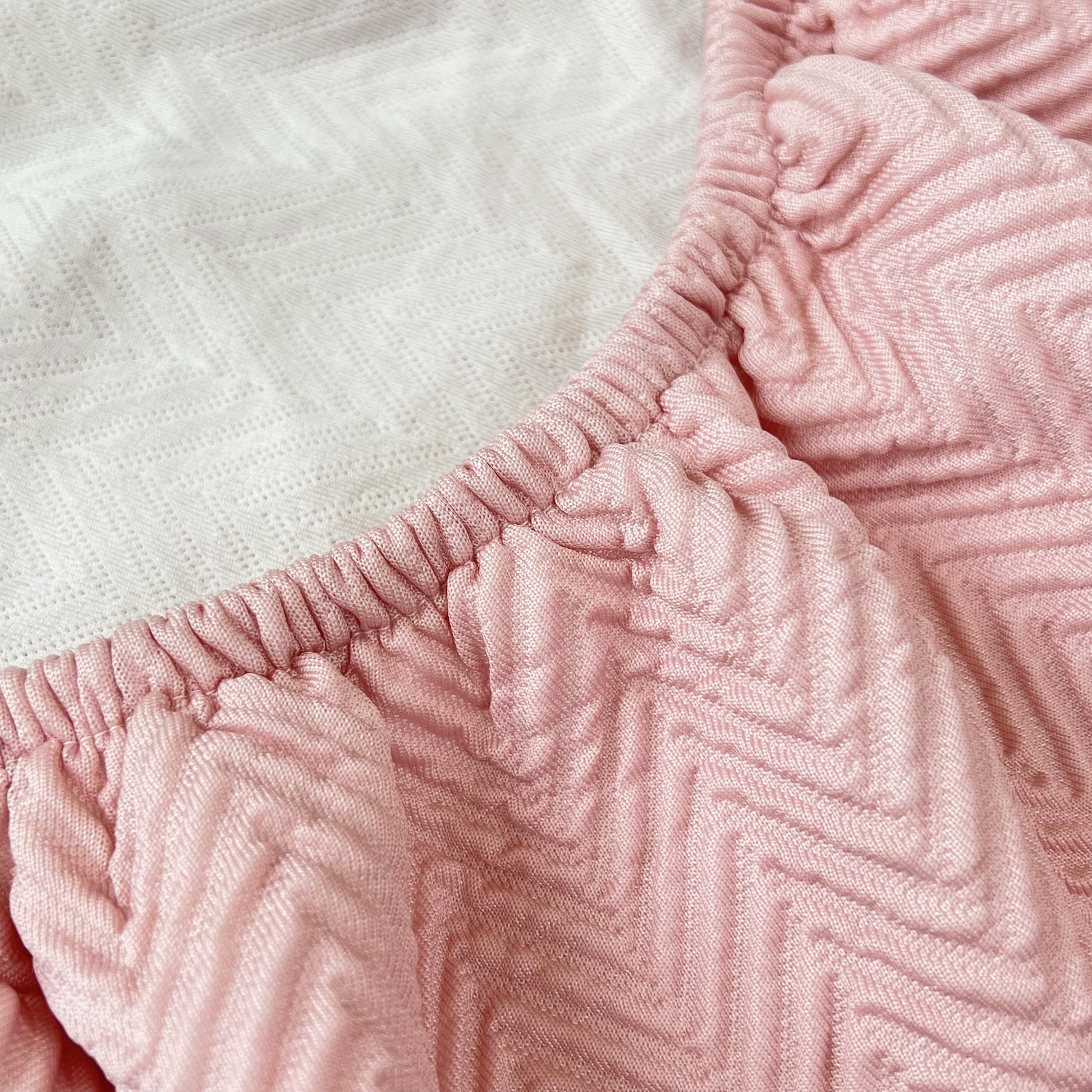 Close-up of Cooling Stretchy Replacement Couch Cushion Covers for Sectional, Individual Couch Seat Cushion Covers in pink fabric