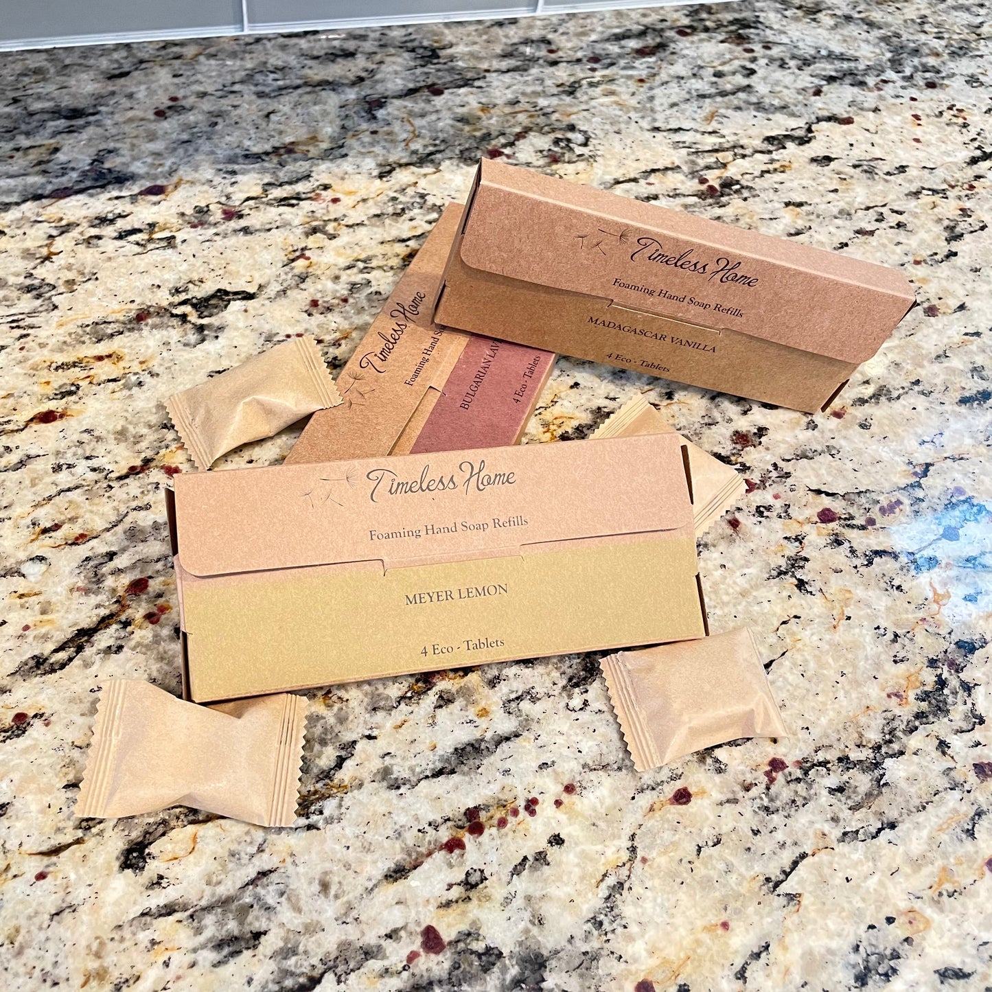 Eco Tab - Hand Soap Refill Pack on granite countertop, sustainable packaging with 4 eco-friendly soap tablets visible.
