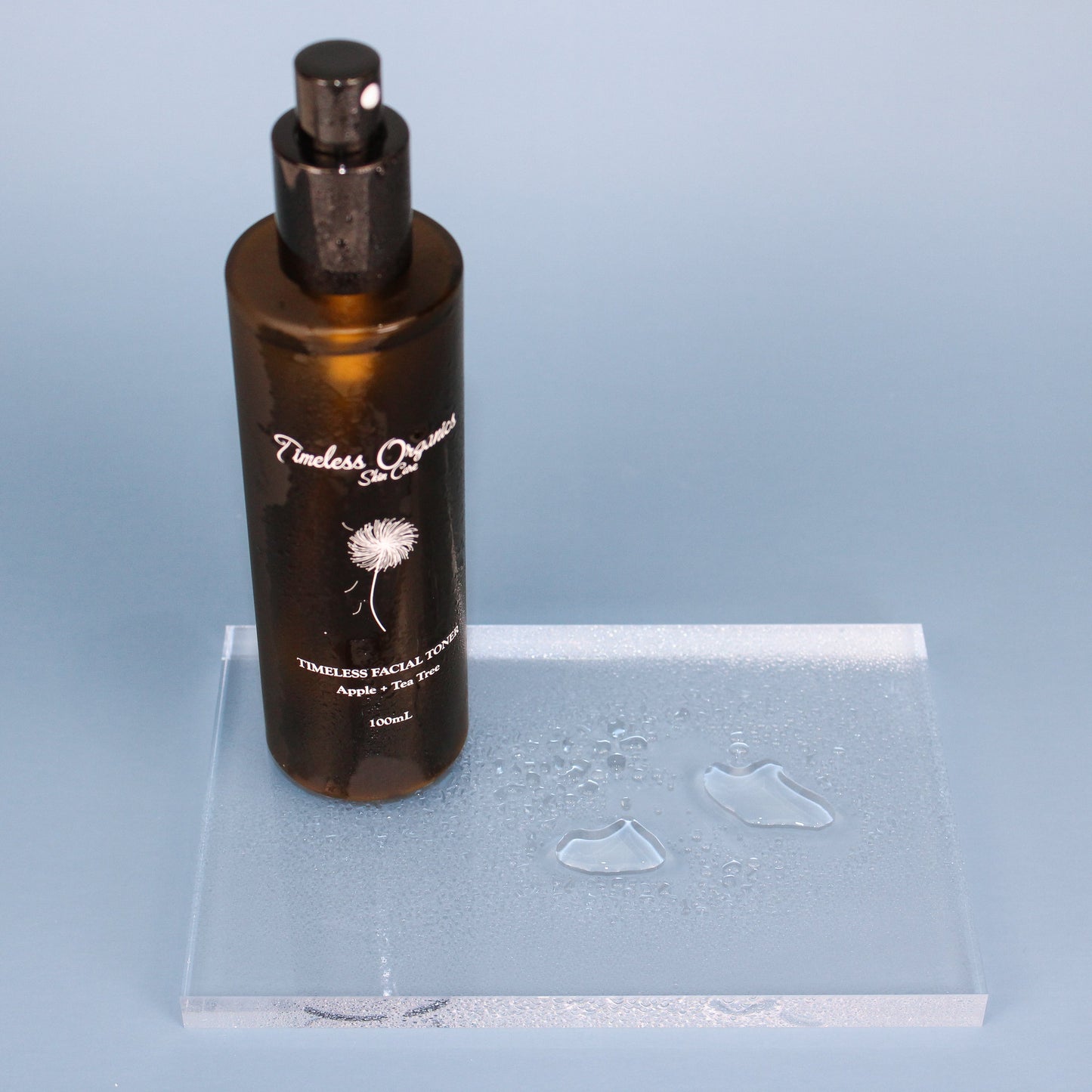 Timeless Toner for Troubled Skin - natural skincare product for acne, excess oil, and clogged pores in 100mL bottle on clear stand.