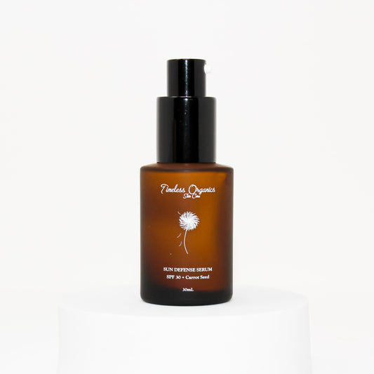 Sun Defense Serum - SPF 30 in amber bottle, offering UVA & UVB protection, hydration, and anti-aging benefits. Size: 30mL.