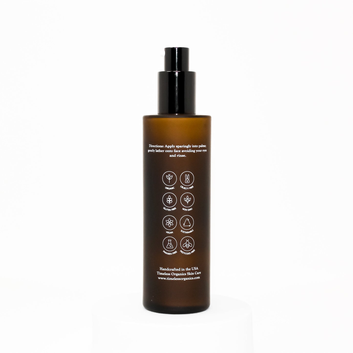 Brown bottle of Ultra-Calm Silk Cleanser with icons displayed on label, designed for gentle, nourishing, and calming skin cleansing.