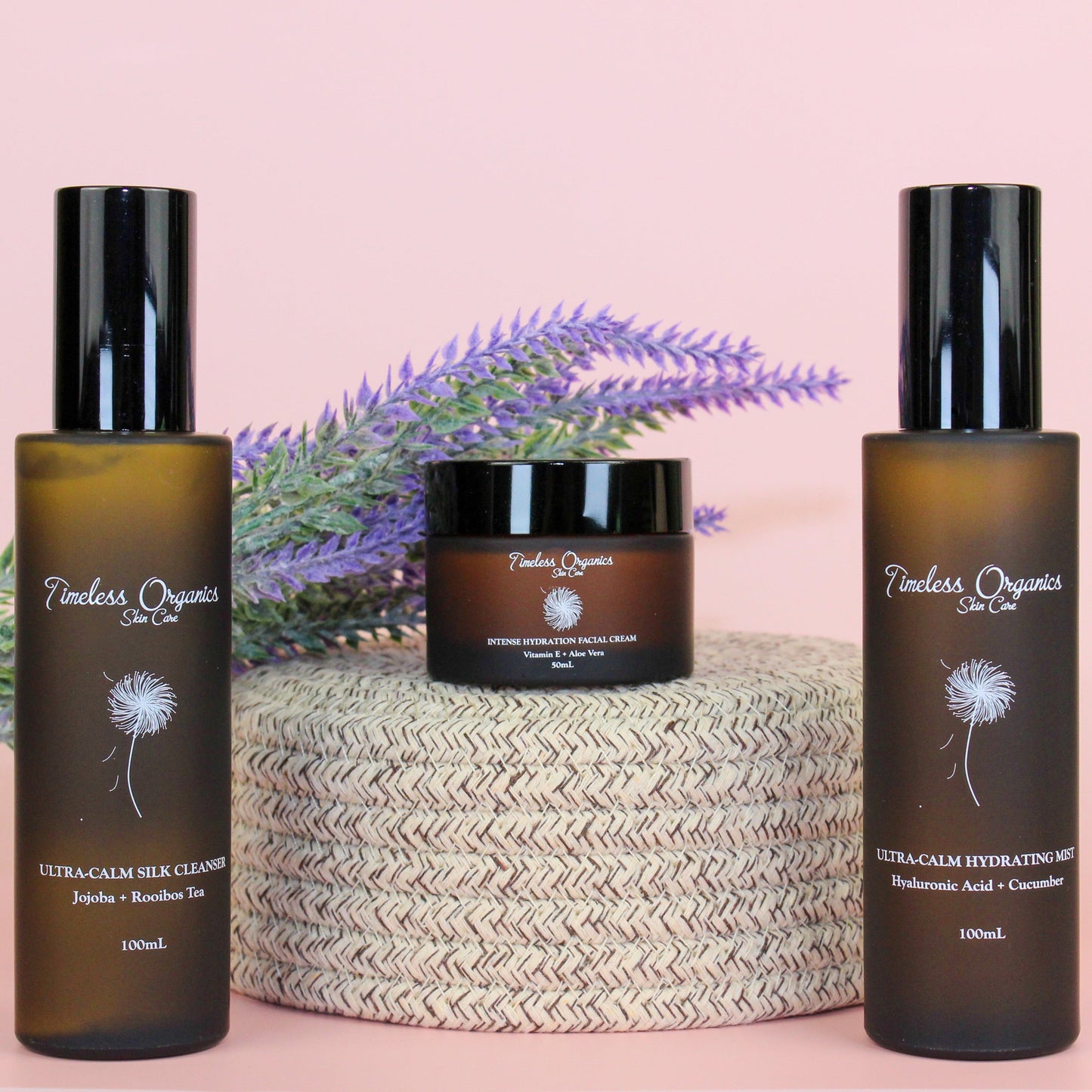 Ultra-Calm Moisturizing Kit with cleanser, toner, and moisturizer for dry, sensitive skin displayed with lavender background.