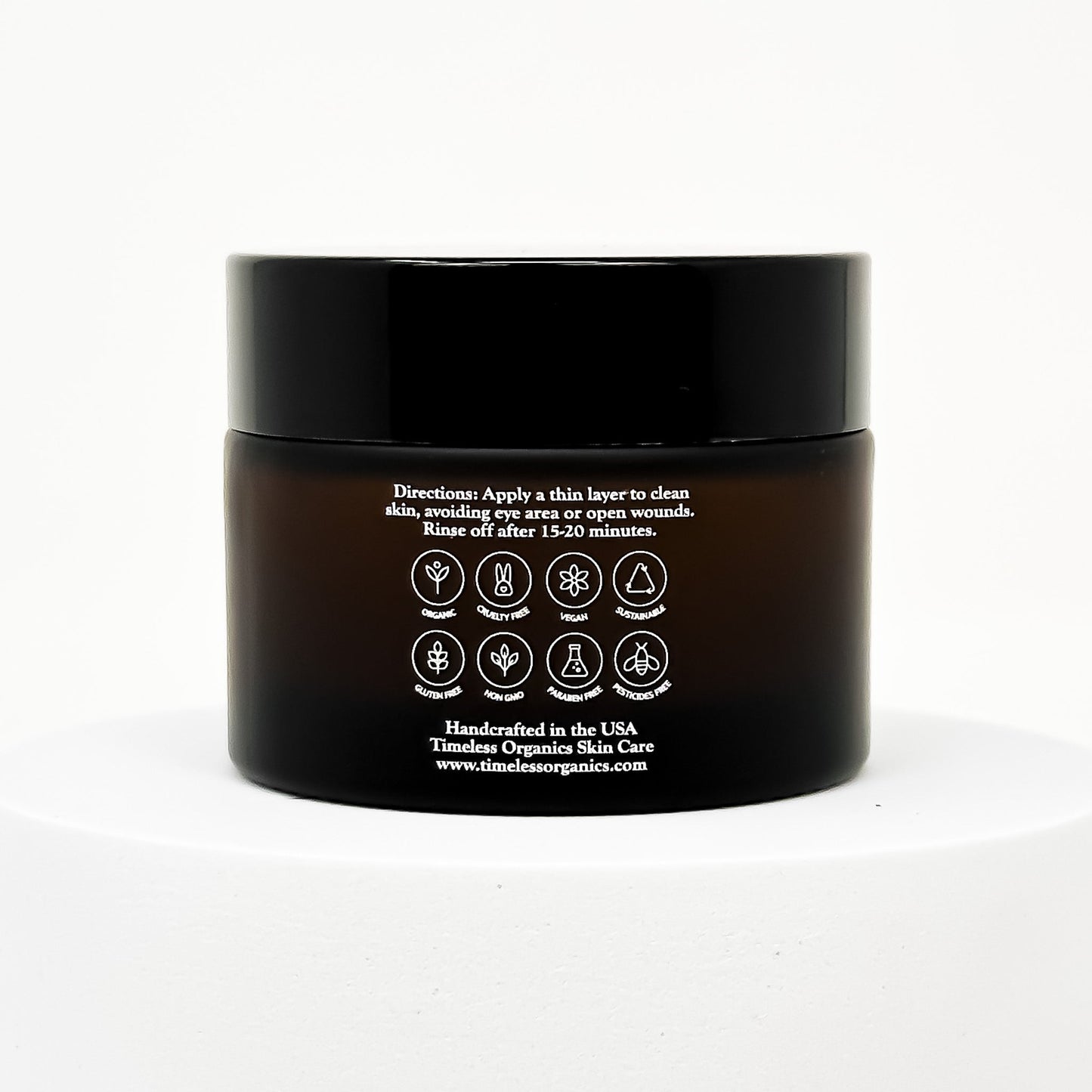 Jar of Clarifying Detox Clay Mask with instructions and symbols on the label, handcrafted in the USA by Timeless Organics Skin Care