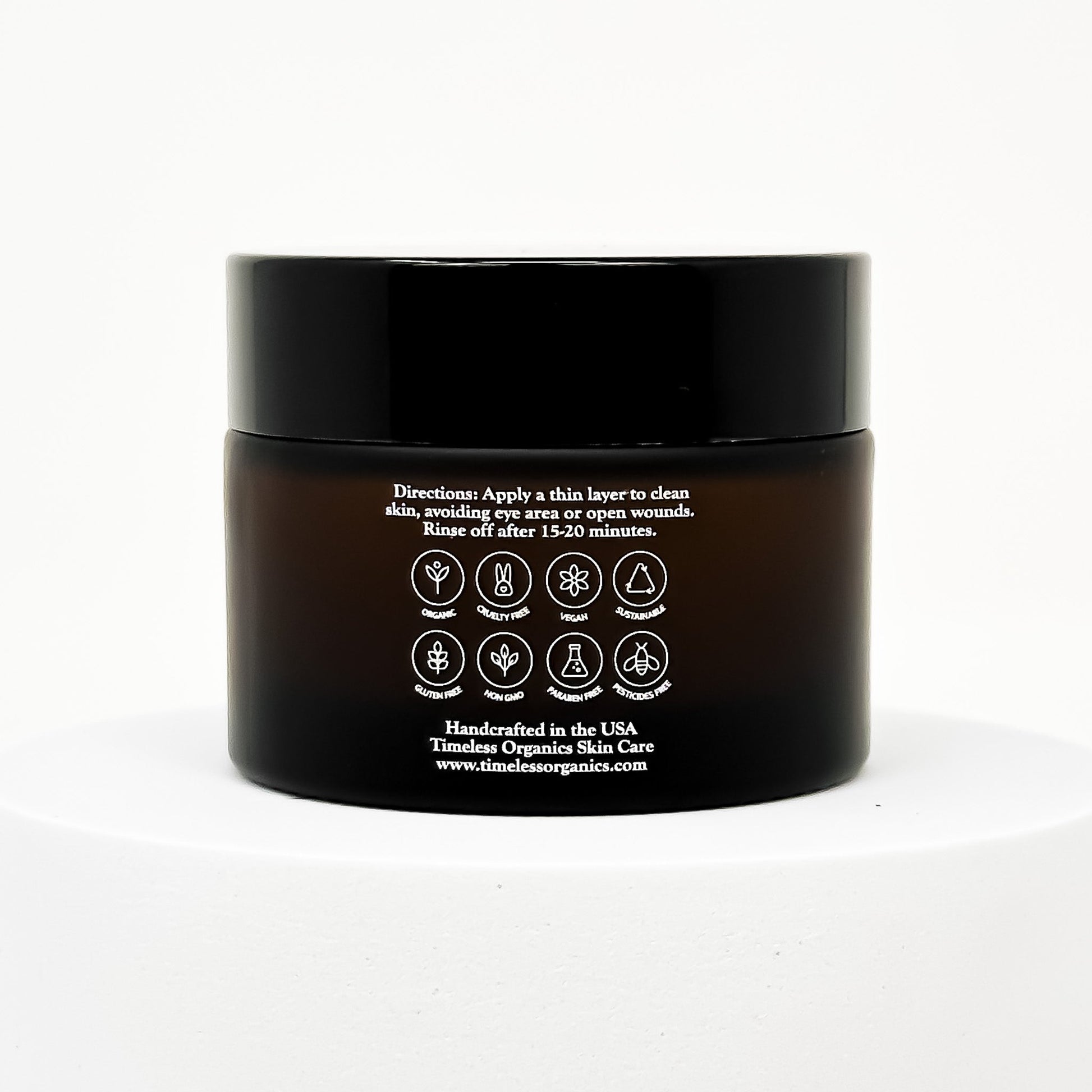 Jar of Clarifying Detox Clay Mask with instructions and symbols on the label, handcrafted in the USA by Timeless Organics Skin Care