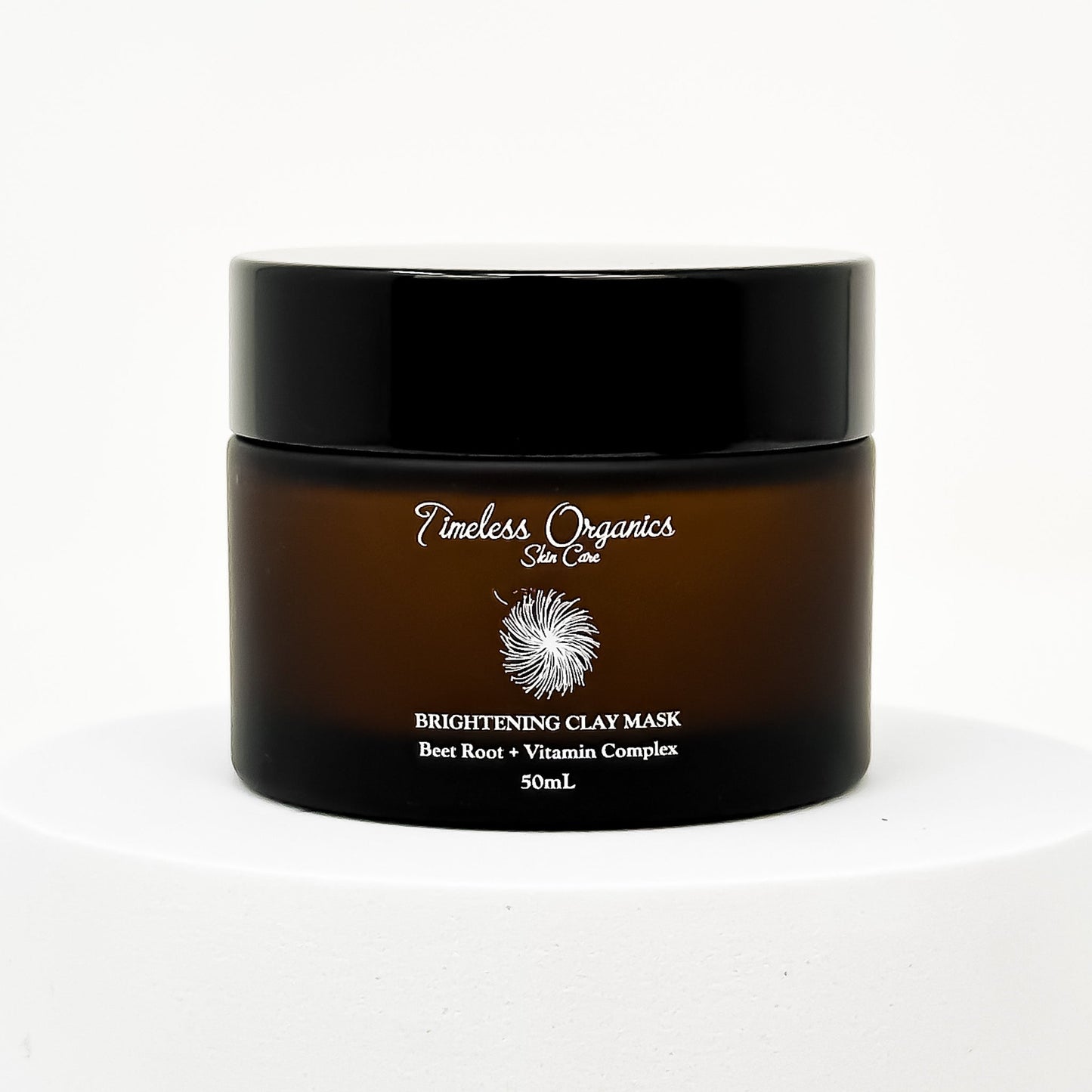 Brightening Clay Mask with beet root and vitamins, 50mL jar for revitalizing and illuminating all skin types.